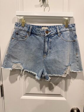 Alice + Olivia Light Wash Distressed Denim Shorts
